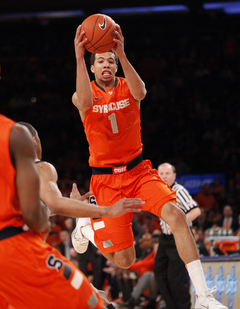 Michael Carter-Williams saves a ball from going out of bounds in the first half of the Big East tournament semifinals. 