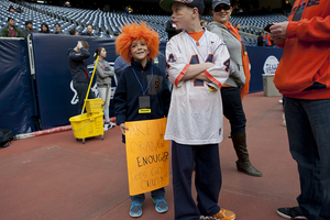 Young fans of the Orange  spectate at the Texas Bowl before kickoff. SU sold thousands of tickets to the game against Minnesota. 