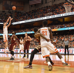 Tyler Roberson (21) subbed out after picking up his fourth foul and didn't return to Syracuse's win over Boston College. He finished with 10 points and 12 boards.