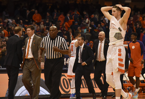 Tyler Lydon lifts his arms up after Syracuse blew a late-regulation lead and lost to Clemson, 74-73, in overtime. Mike Hopkins said the Orange needed to learn to finish, but for the third straight game, the last five minutes proved to be too much to overcome. 