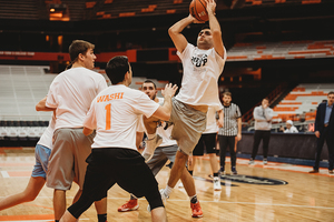 Senior Staff Writer Matthew Gutierrez shoots from the elbow.