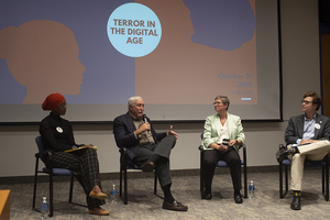 Remembrance Scholar Hassina Adams (left), Maxwell professor Sean O'Keefe, iSchool professor Jennifer Stromer-Galley and Remembrance Scholar Adam Bayer spoke at the panel. 