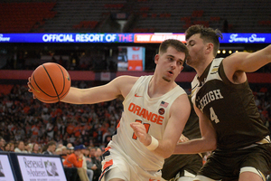 Joe Girard III scored 28 points in Syracuse's narrow win over 2-13 Louisville. 