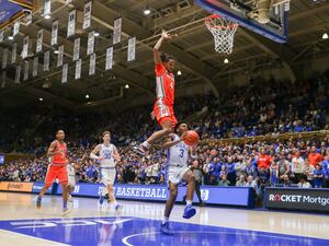 Duke's Mark Mitchell registered a career-high 21 points as Syracuse faded in the second half with the Blue Devils coming out on top 86-66.