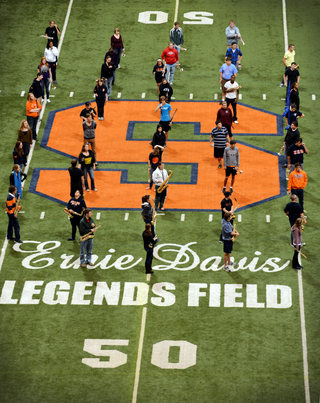 The SU Marching Band practices in the Carrier Dome on Sept. 24. The band practices three nights a week and on Fridays if there is a home game.