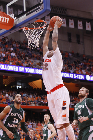 DaJuan Coleman slams home a dunk in SU's win over Eastern Michigan.