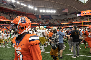 Defensive back Duce Chestnut heads to the locker room after greeting Notre Dame players on the field postgame. 